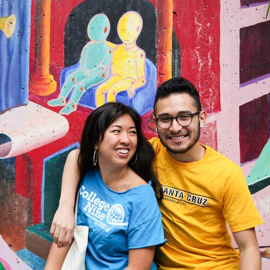 Students with mural in background