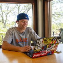 Student with laptop at Oakes Cafe