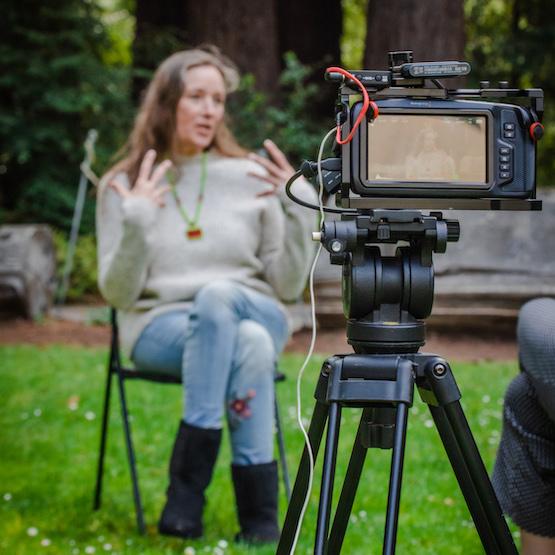 Student filming an interview