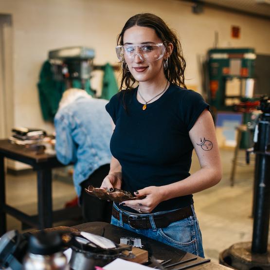 Student in metal shop