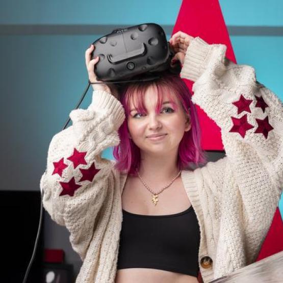 An individual wearing a virtual reality headset