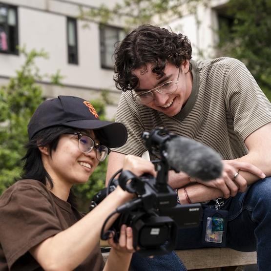 two students looking at the camera