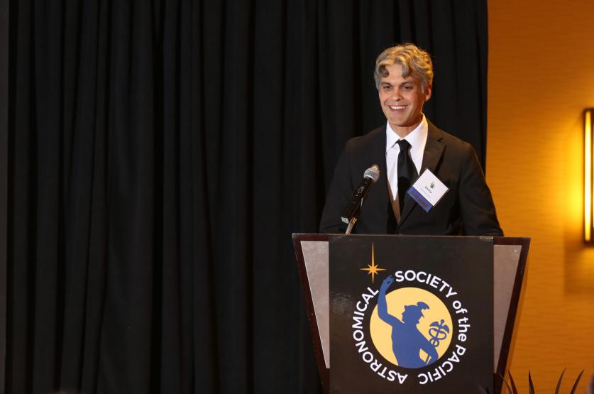 person standing behind a podium